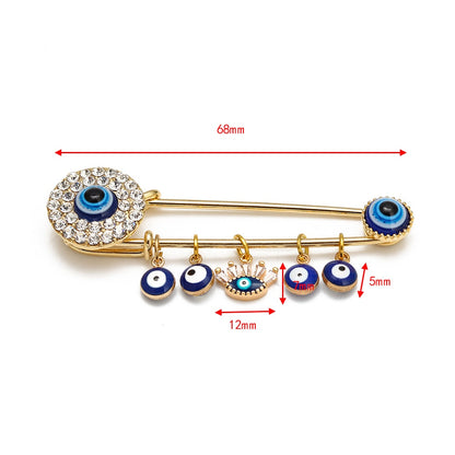 Elegant Gold-Toned Turkish Evil Eye Brooch with Tassel Detail – Timeless Charm for Women & Girls